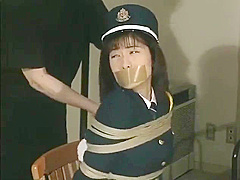 Japanese policewoman helplessly bound