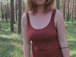 Playful redhead pissing forest and